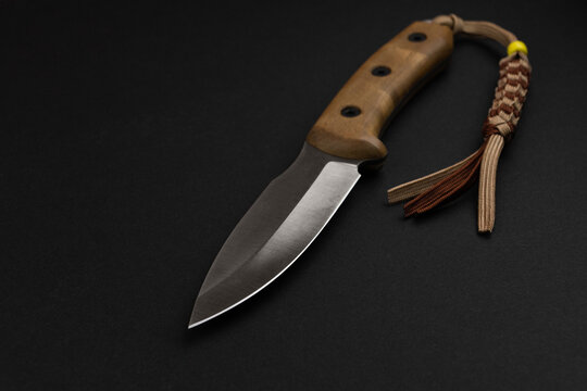 Tourist knife, on a black background