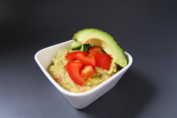 Bowl of fresh Guacamole. Vegetables food.