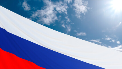 A waving Russian flag with a tricolor on the background of the sun and the sky with clouds. Banner for the Day of Russia on June 12