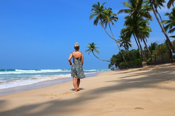 pretty girl on a dream beach with palm trees - Sri Lanka, Asia