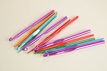 colorful metal crochet hooks close up