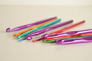 colorful metal crochet hooks close up