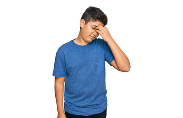 Fototapeta premium Teenager hispanic boy wearing casual clothes tired rubbing nose and eyes feeling fatigue and headache. stress and frustration concept.