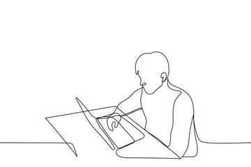 man sitting at a laptop and typing with his right hand - one line drawing. concept of freelancer, travel work, office, coworking, work from home, freelancer, copywriter, designer,