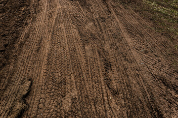 Wheel track on mud for background