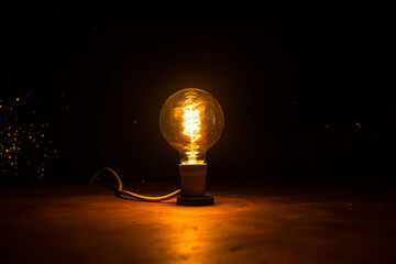 Beautiful retro luxury interior bulb lighting lamp decor glowing in dark.