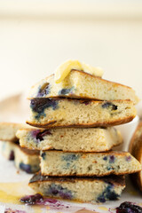 Low-carb pancakes with blueberries and butter Keto diet concept.