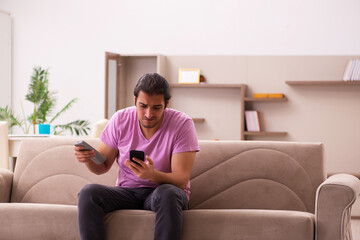 Young man staying at home during pandemic