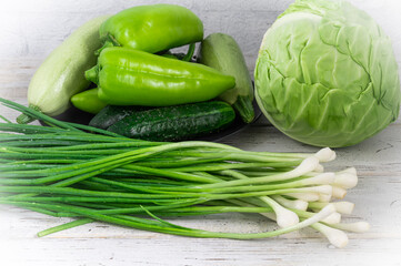 green vegetables on a cutting board