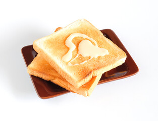 Dishware with many slices of toast with topping . Baking Bread.