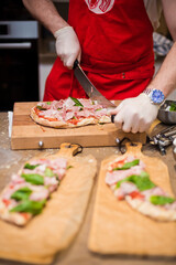 chef preparing pizza