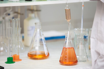 Laboratory with glass test tubes for alcoholic beverages.