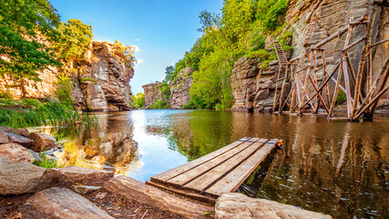 Fototapeta na wymiar Buky canyon landscape, river with a high rocks in the water, Ukraine