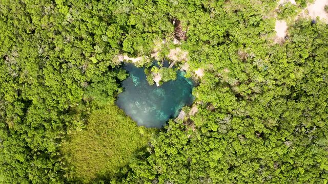 Aerial view of the beautiful heart shaped cenote 