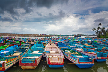 Group of fishing boats on fishing harbour. Thengapattanam, Kanyakumari district, Tamilnadu,South India. 30-January-2021.