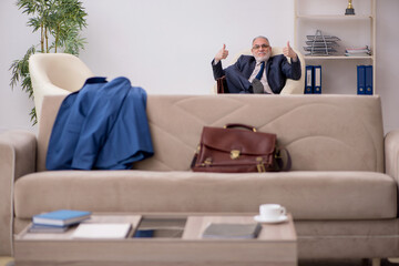 Old businessman employee waiting for business meeting
