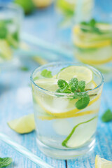 Glasses with lemon and lime lemonade
