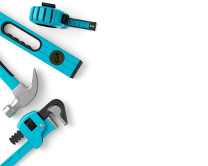 Top view of green construction tools for repair and installation on white