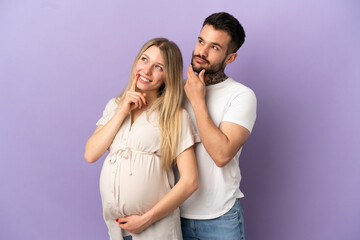 Young couple pregnant and thinking