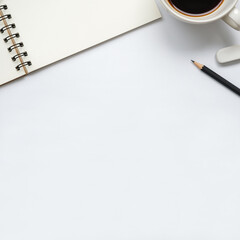 Open blank notebook with cup of coffee, pencil and eraser on white background, copy space for text, top view of workspace.
