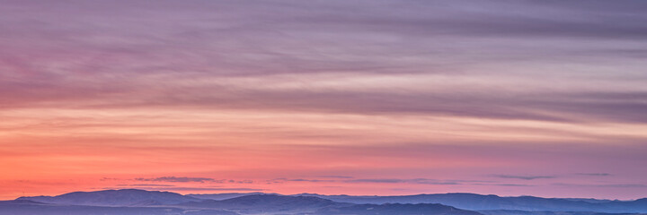 Obraz premium panorama of colorful sky over Yampa River valley at dawn near Dinosaur National Monument in north western Colorado
