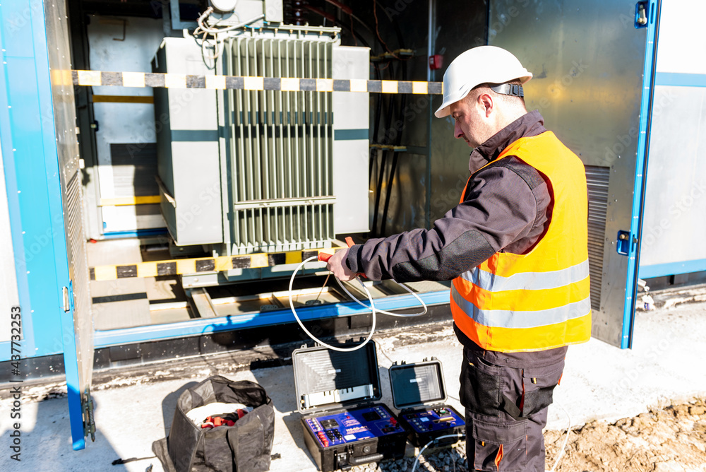 Wall mural execution of electrical measuring works on the power transformer