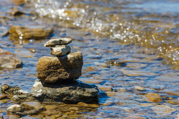 Stack of rocks at the river's edge