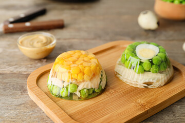Tray with tasty aspic on table