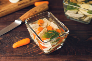 Bowl of tasty aspic on table