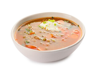 Bowl of tasty lentil soup on white background