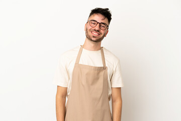 Restaurant waiter caucasian man isolated on white background laughing