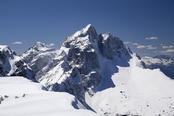 severe view of spring still snowy slovenian alps Mala Mojstrovka