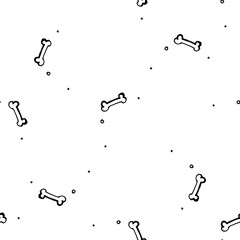 vector seamless pattern of small bones and dots randomly arranged .a pattern of small bones and dots of different sizes, hand-drawn in doodle style with a black line on a white background for the desi