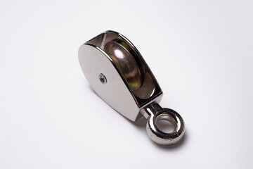 Metal steel pulley isolated in white background used for lift heavy objects