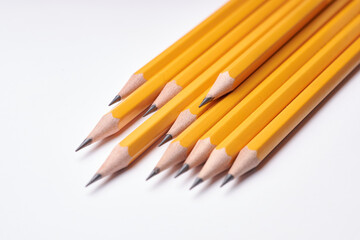 Pencils arrangement isolated on white background, school supplies. Educational and back to school concept of writting utensils
