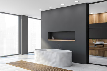 Gray and wooden bathroom corner with tub,window and sink