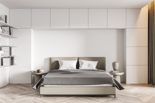 Stylish minimalistic white bedroom interior