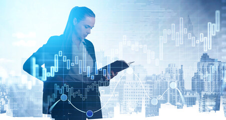 Businesswoman studying business notebook, graph changes lines and bar chart