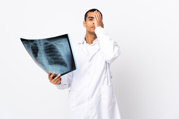 African American traumatologist over isolated whitebackground covering a eye by hand