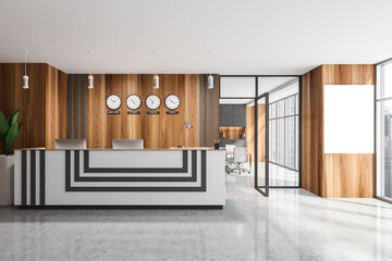Reception desk in wooden office with clocks