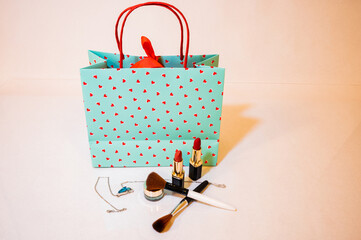 A green colour love sign valentines day gift shopping bag for woman with cosmatics gift for loved...