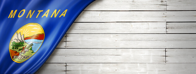 Montana flag on white wood wall banner, USA