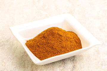 Dry Paprika powder in the bowl