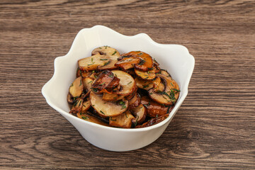 Roasted champignon with herbs and spices