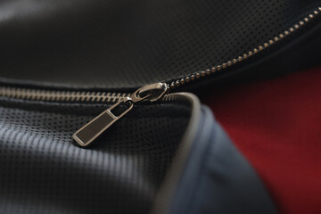 Black jacket with closed zip. Accessories clothing selection © H_Ko