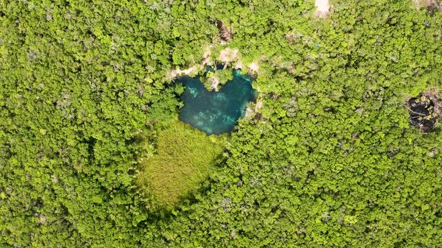 Aerial view of the beautiful heart shaped cenote 