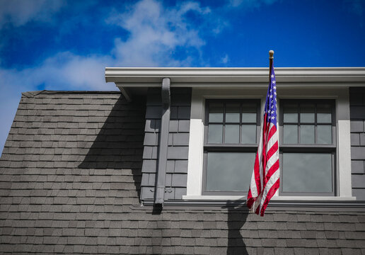 american flag on a building