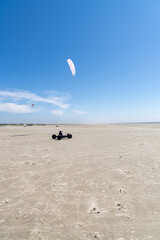 kite buggy enjoying a windy day on the Wadden Sea island beaches of western Denmark