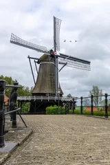 Foto auf Leinwand view of the Molen de Kaal windmill in the center of Sloten © makasana photo