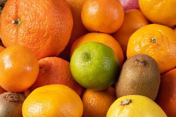 citrus background with kiwi close-up. Vitamin fruits set, healthy food concept